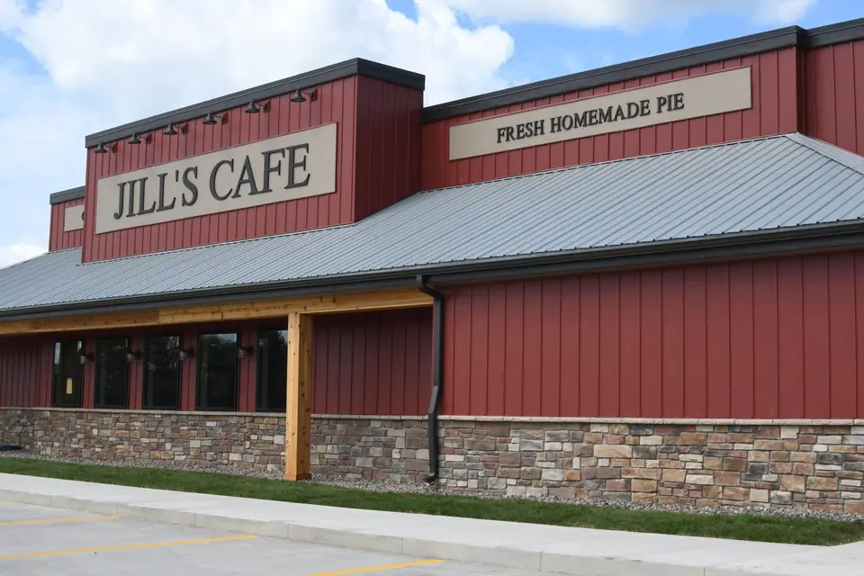 Jill's Cafe building with red siding and the Fresh Homemade Pie sign